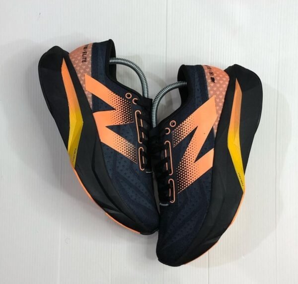 First Copy Shoes New Balance Feulcell SC Elite V4 - Black / Orange